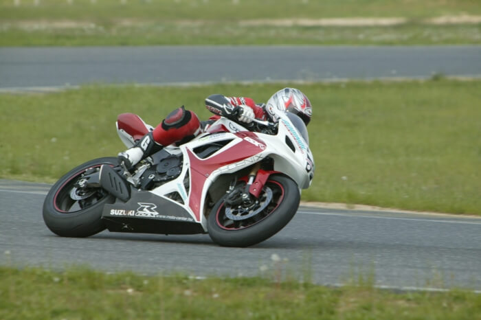 Motorcylce with 4 stroke engine on the track