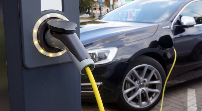 Electric car at a charging station