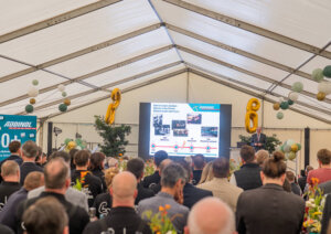 Mr. Wildegger is giving a presentation in honor of ADDINOL's 90th anniversary